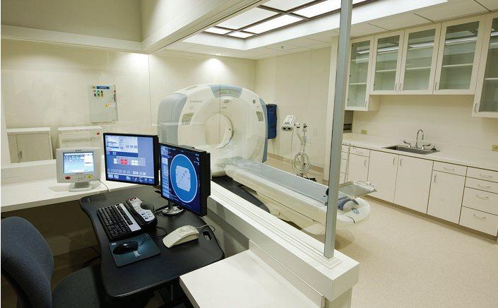 CT scanner room for refurbished medical imaging equipment total cost of ownership planning.
